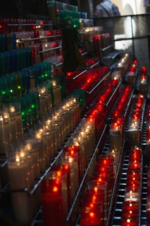 Lit candles in church