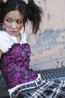 Young Asian woman wearing funky clothing