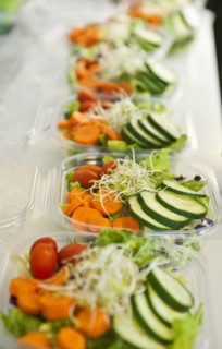 Sliced vegetables in plastic containers