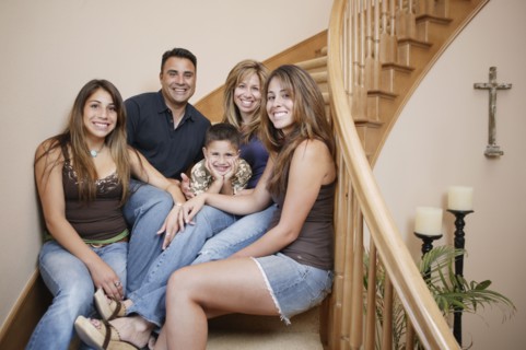 Family smiling for the camera together