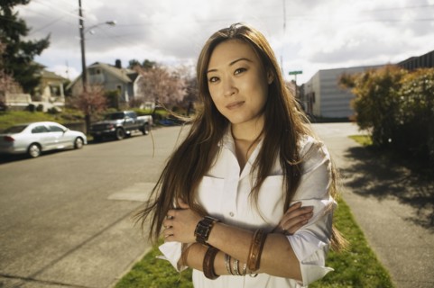 Portrait of Asian woman on residential street
