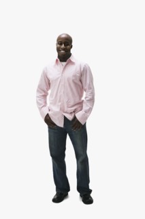 Portrait of African man with thumbs in pockets