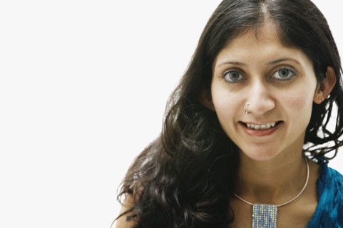 Close up of Middle Eastern woman smiling