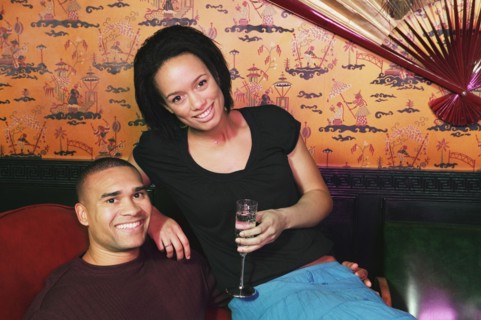 Portrait of African couple on chair