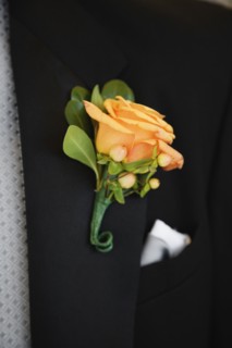 Close up of boutonniere on lapel