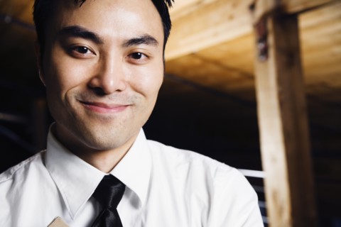 Close up of Asian man smiling