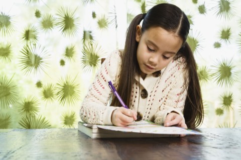 Asian girl doing homework