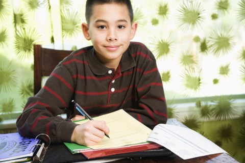 Asian boy doing homework