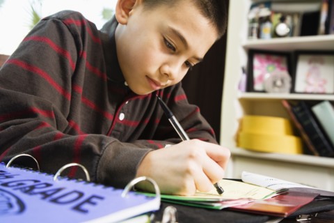 Asian boy doing homework