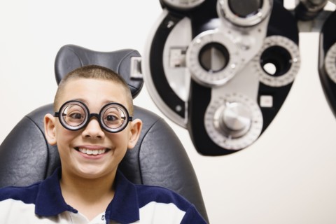 Asian boy in eye doctor's office