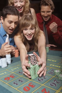 Woman successfully gambling in a casino