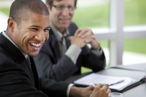 African businessman laughing