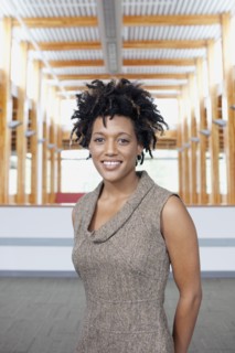 Mixed race businesswoman smiling