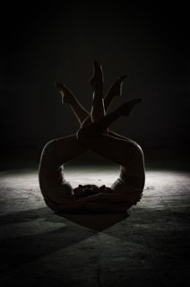 Silhouette of dancers posing in studio