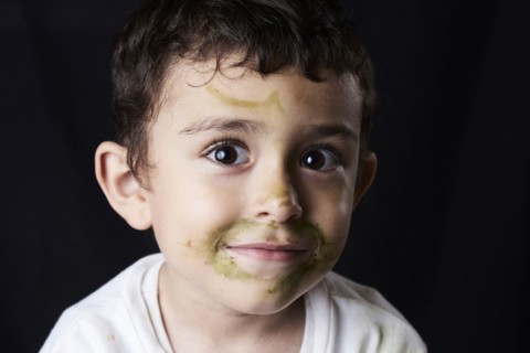 Close up of Hispanic boy with messy face