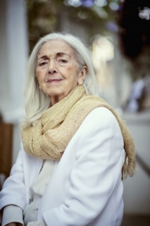 Portrait of serious older Caucasian woman wearing scarf