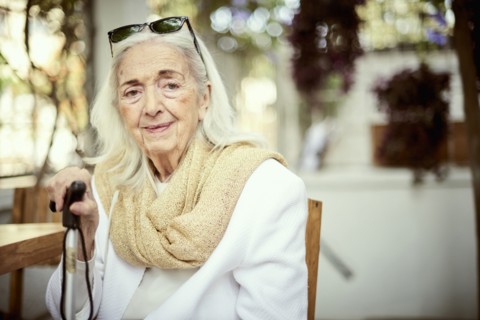 Portrait of smiling older Caucasian woman wearing scarf