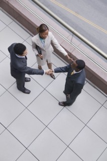 Multi-ethnic business people shaking hands