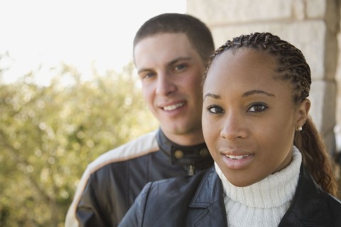 Multi-ethnic couple on balcony