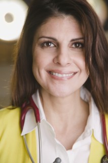 Confident mixed race doctor smiling