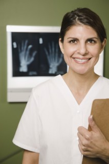 Doctor with medical chart and x-rays