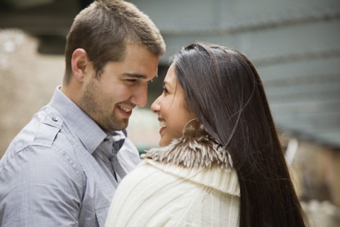 Couple smiling at each other