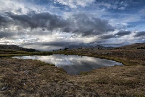 Reflection of clouds in remote lake