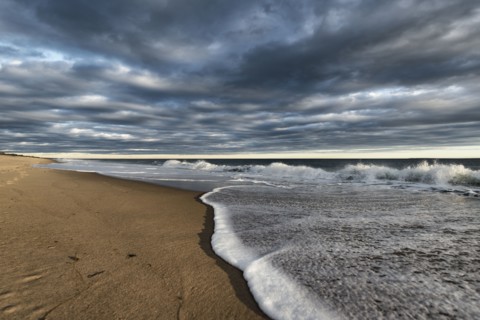 Clouds over ocean beach