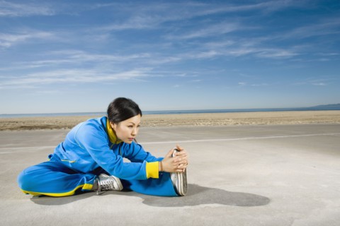 Asian woman stretching