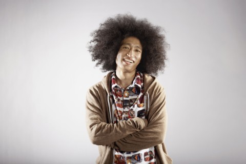 Confident mixed race man with arms crossed
