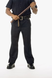 Studio shot of African male police officer
