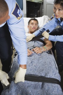 Man in ambulance with paramedics