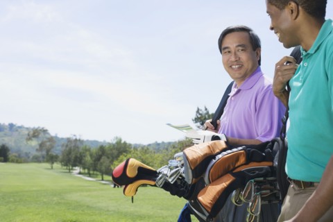 Multi-ethnic men on golf course