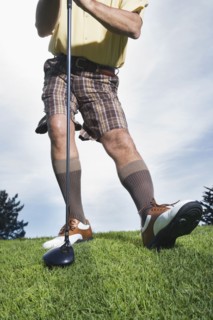 Man holding golf club