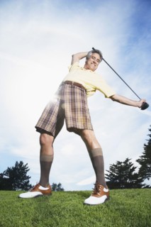 Man holding golf club