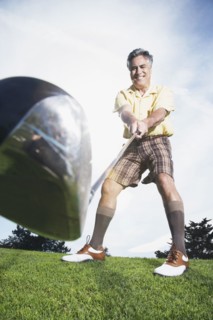 Man swinging golf club