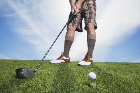 Man swinging golf club