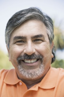 Close up of Hispanic man smiling