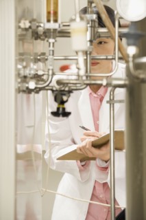 Chinese scientist checking gauge