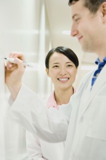 Scientists working in laboratory