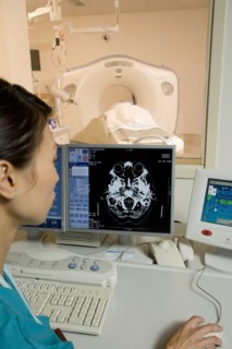 Chinese technician checking MRI results in hospital