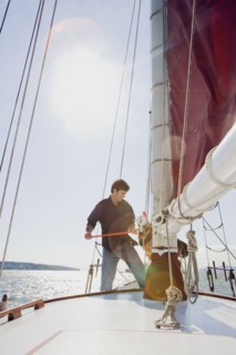 Caucasian man on sailboat