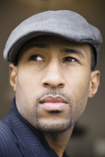 African American man wearing cap