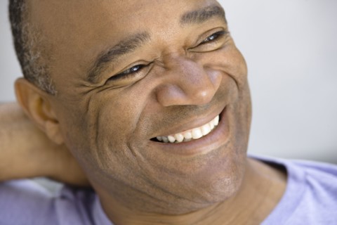 Smiling mixed race man