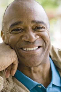 Smiling mixed race man