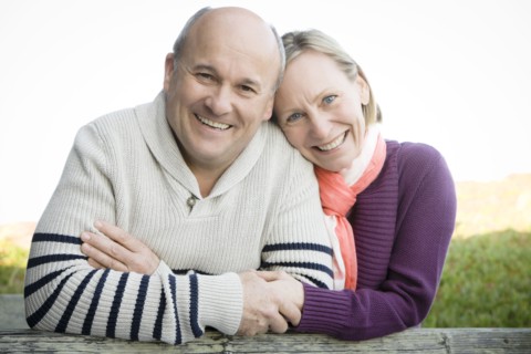 Caucasian couple hugging