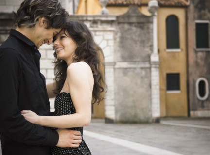 Italian couple hugging outdoors