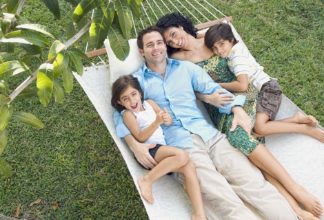 Family relaxing in hammock