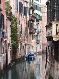 Boat moored in ornate canal