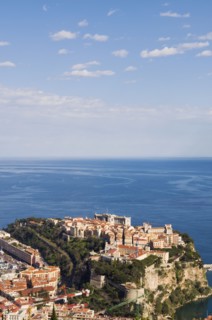 Houses on cliff top near ocean